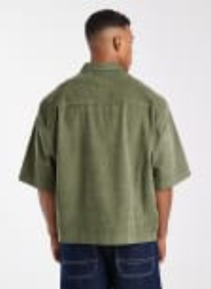 ASOS DESIGN - boxy oversized corduroy shirt with badge in dark green