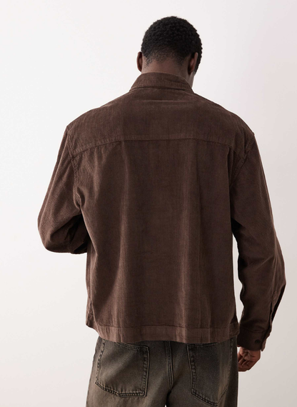 ASOS DESIGN - boxy oversized cord rugby shirt in brown