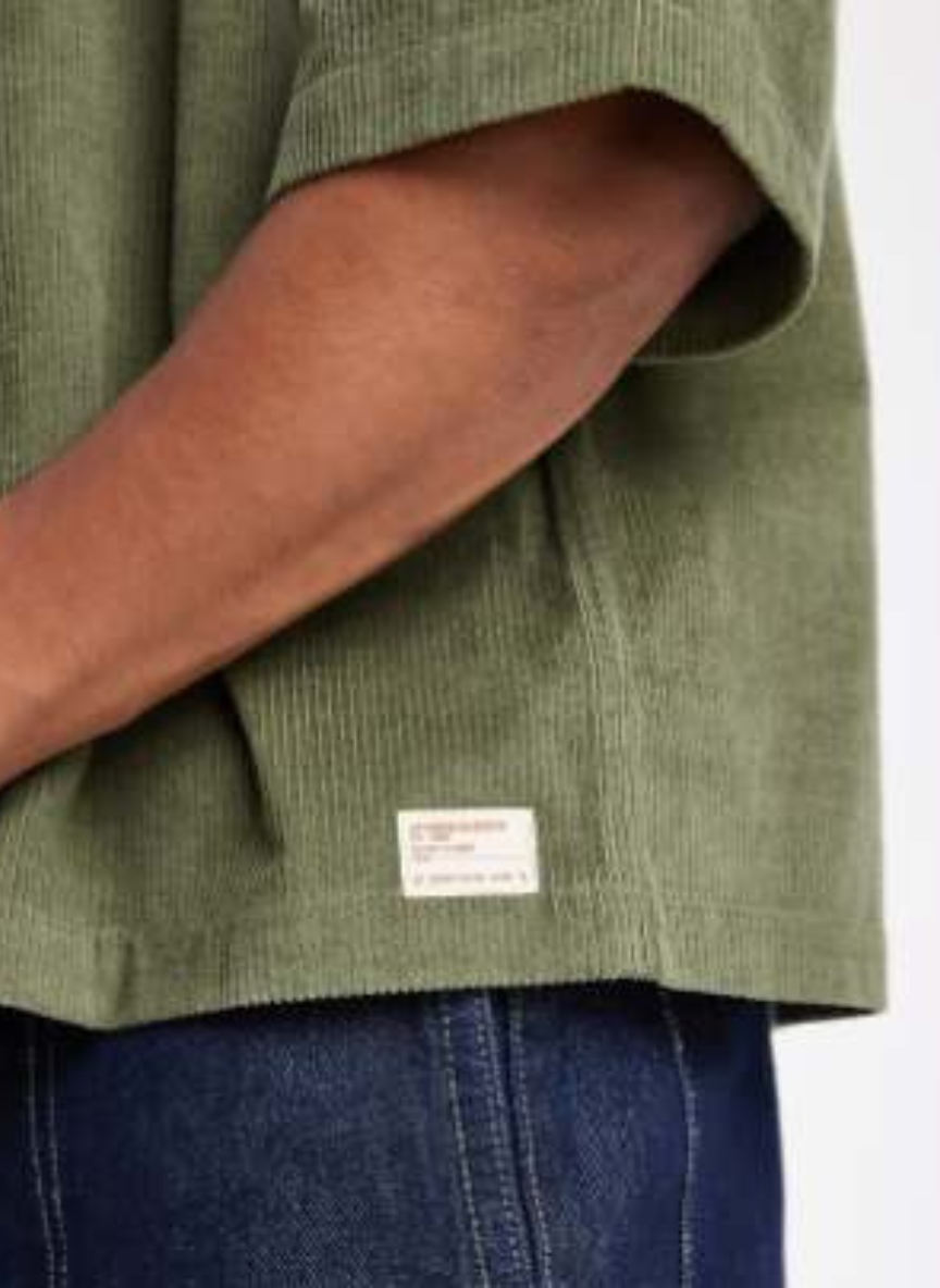ASOS DESIGN - boxy oversized corduroy shirt with badge in dark green