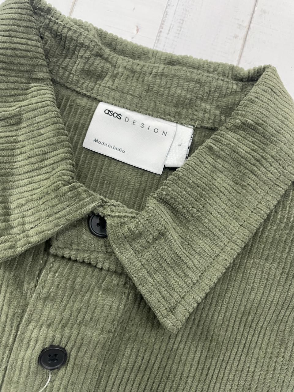 ASOS DESIGN - boxy oversized cord rugby shirt in green